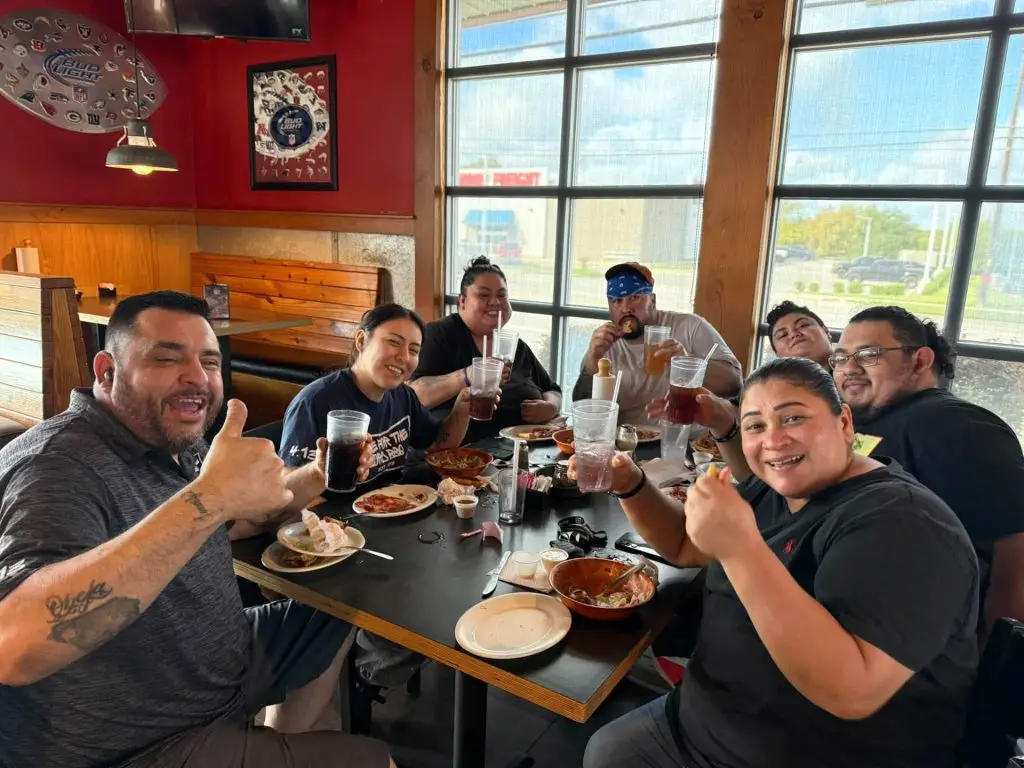 Customers eating together in the dining room