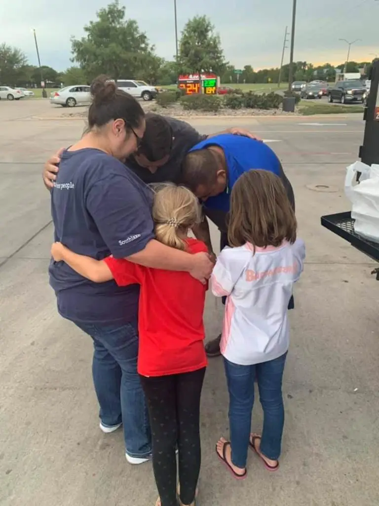 Praying together with a family