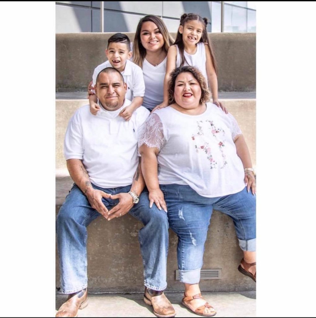 Angel and Jennifer Espinoza with family