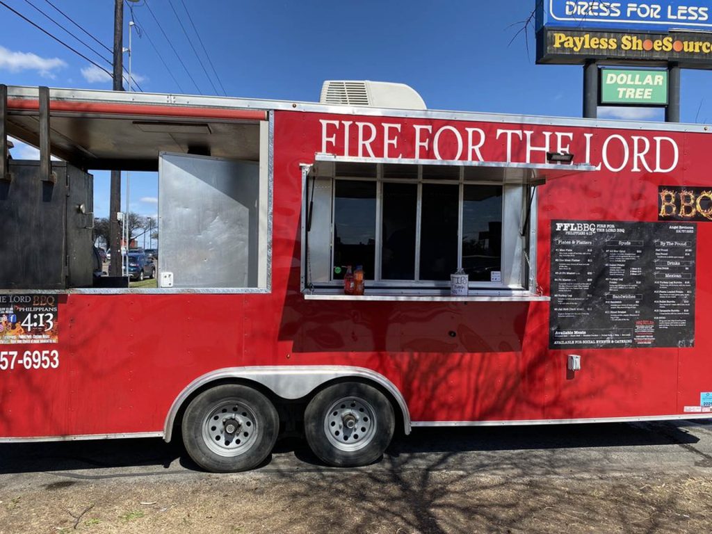The red Fire for the Lord BBQ food truck
